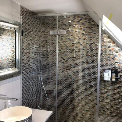 new shower screen in mosaic tiled shower