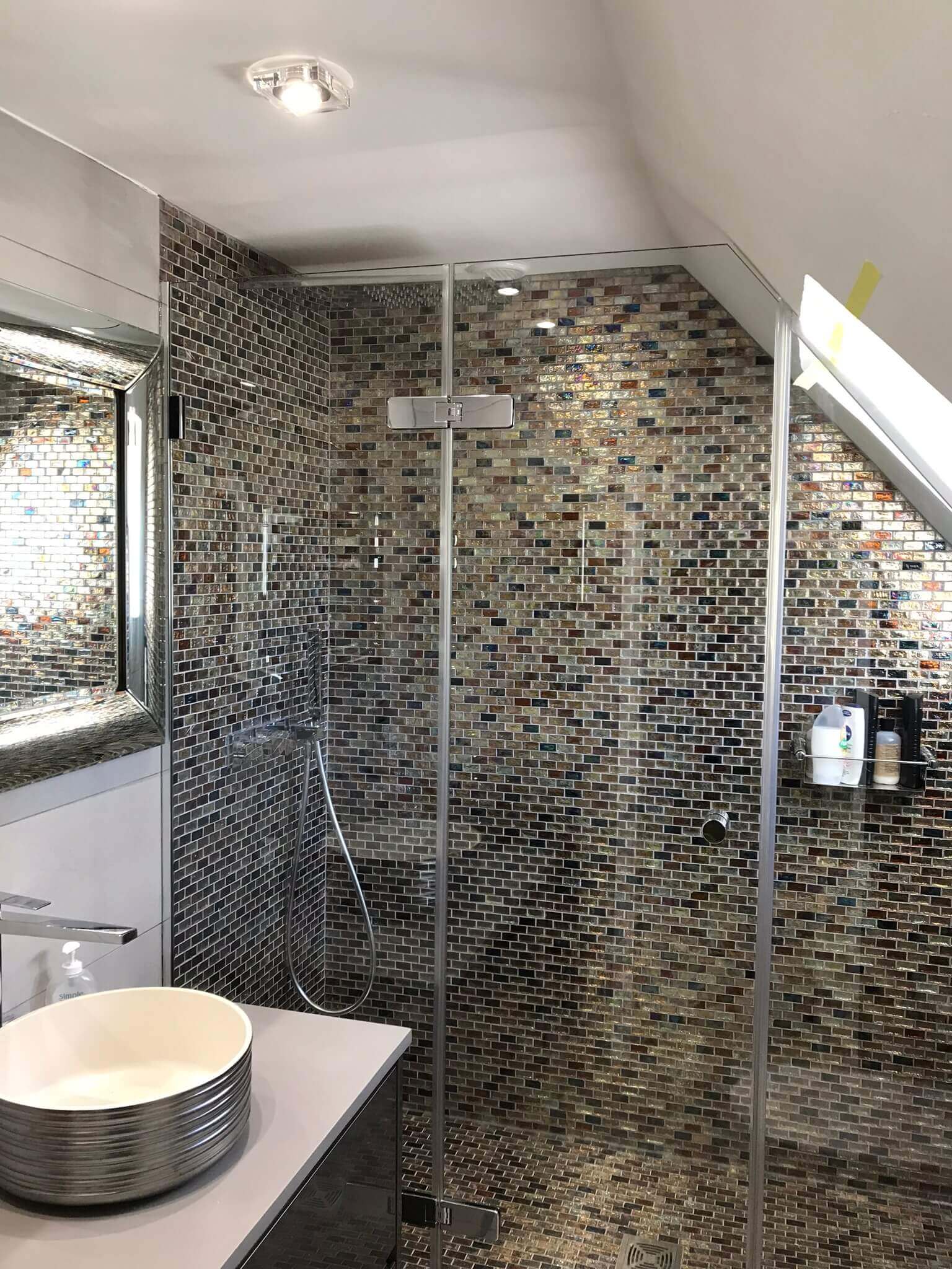 new shower screen in mosaic tiled shower