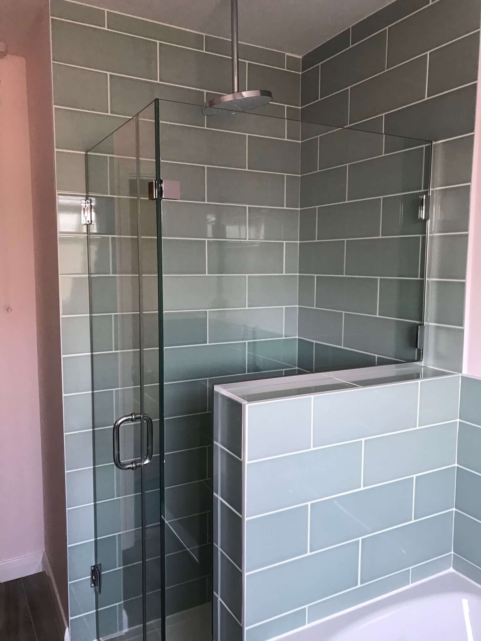 square shower with new shower screens in bathroom
